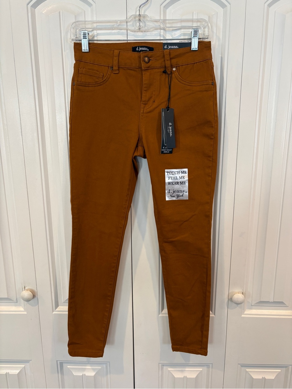 D. Jeans brown jeans size 4/27